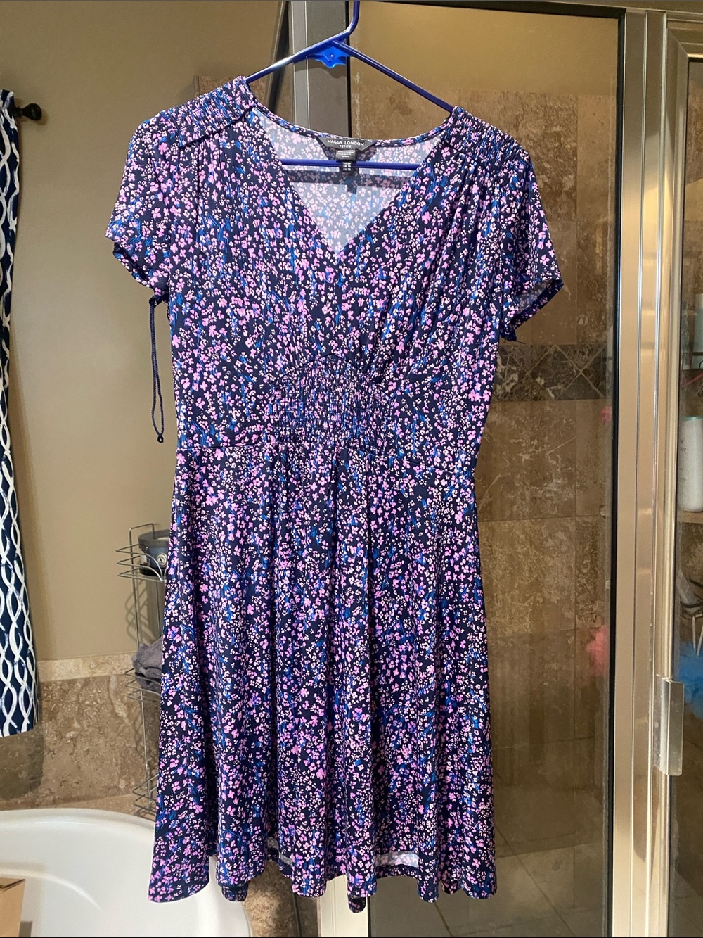 Women’s navy and lavender floral dress with rushing under the breast